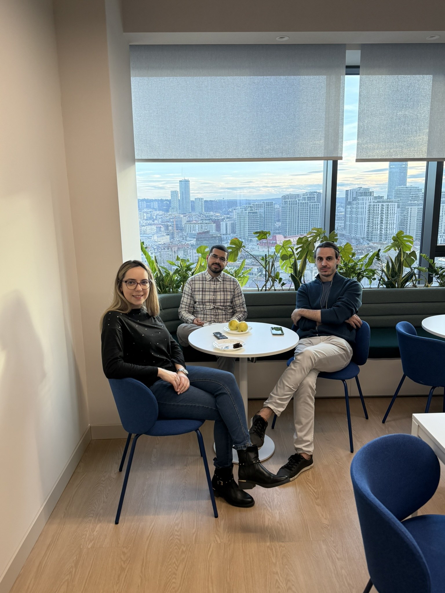Tanishpreet with colleagues in the office